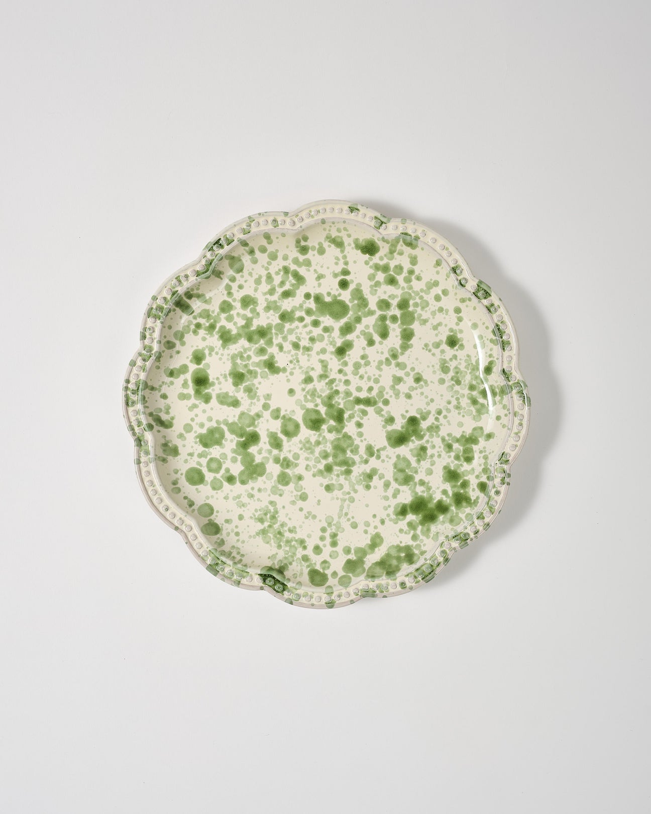 a green and white plate